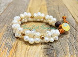 White Freshwater and Tahitian Pearls and leather bracelets